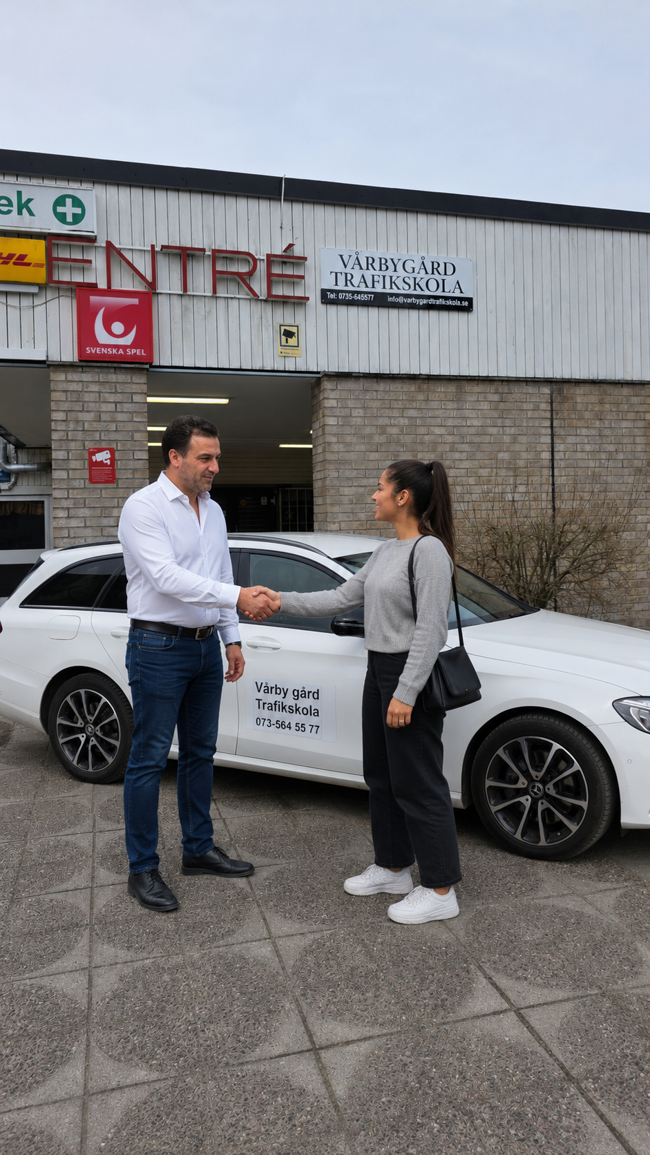 Student and instructor shaking hands after progress
