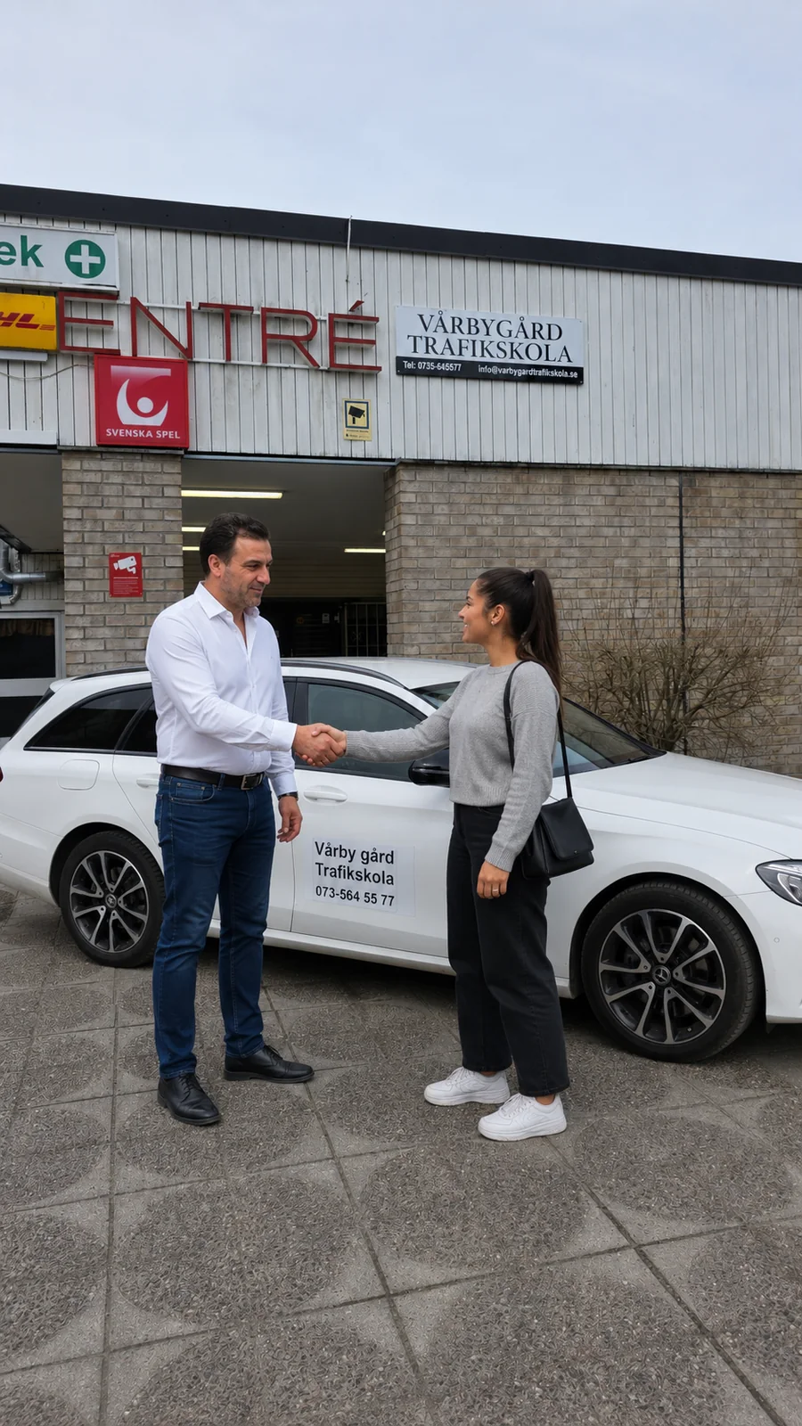 Student and instructor shaking hands after progress